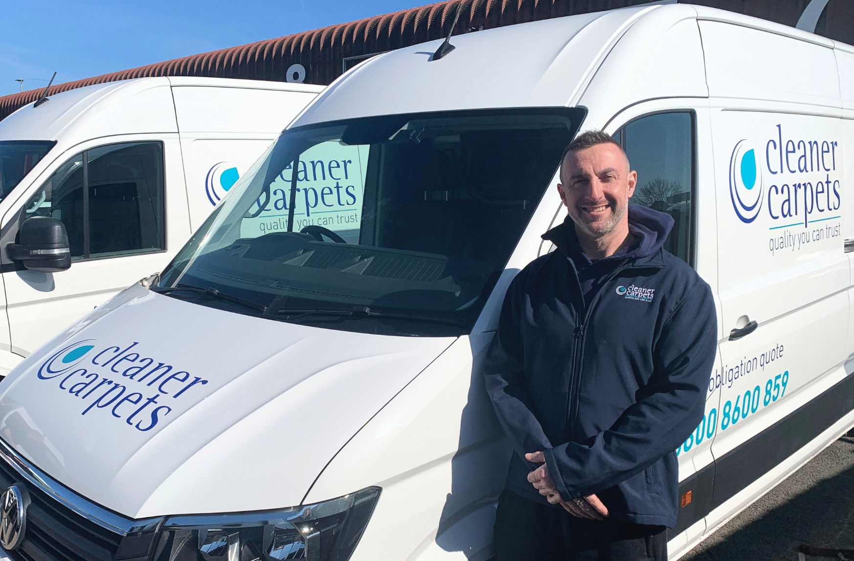 James from Cleaner Carpets with the service van in Exmouth, offering 2-hour arrival slots.