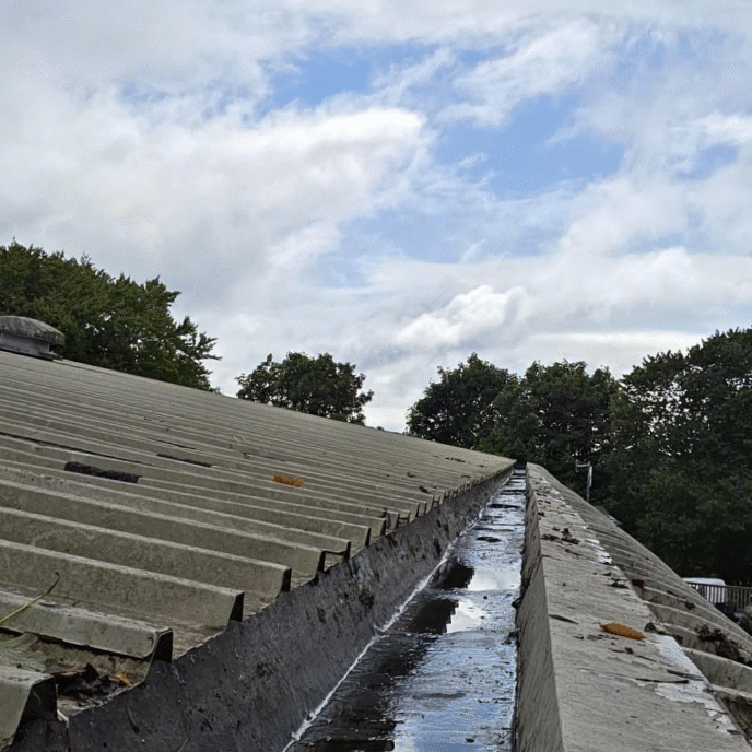 Industrial-scale gutter clearing and asset protection for large warehouses.