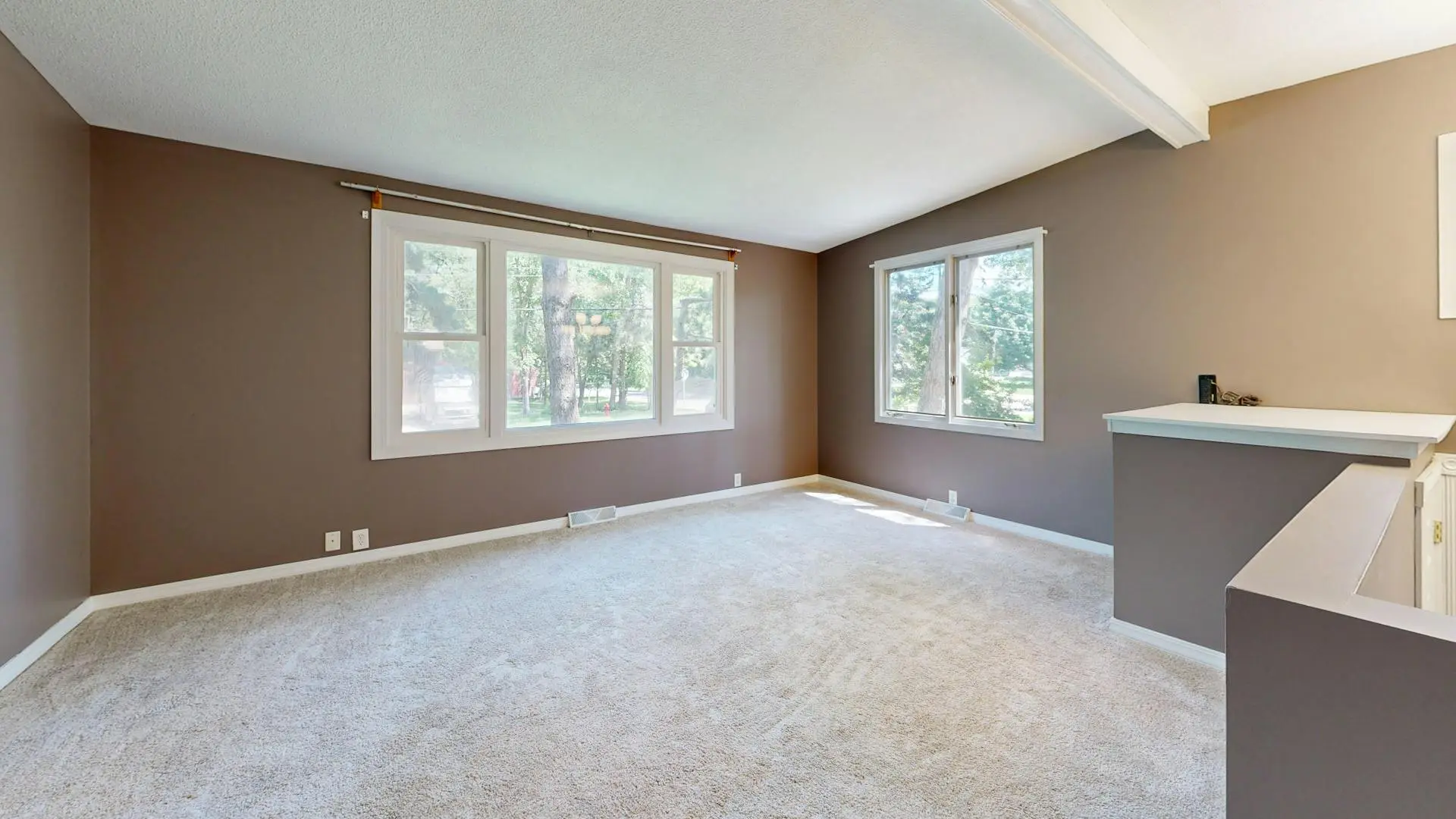 Immaculate living space featuring perfectly clean, bright carpets after a restorative deep extraction service.